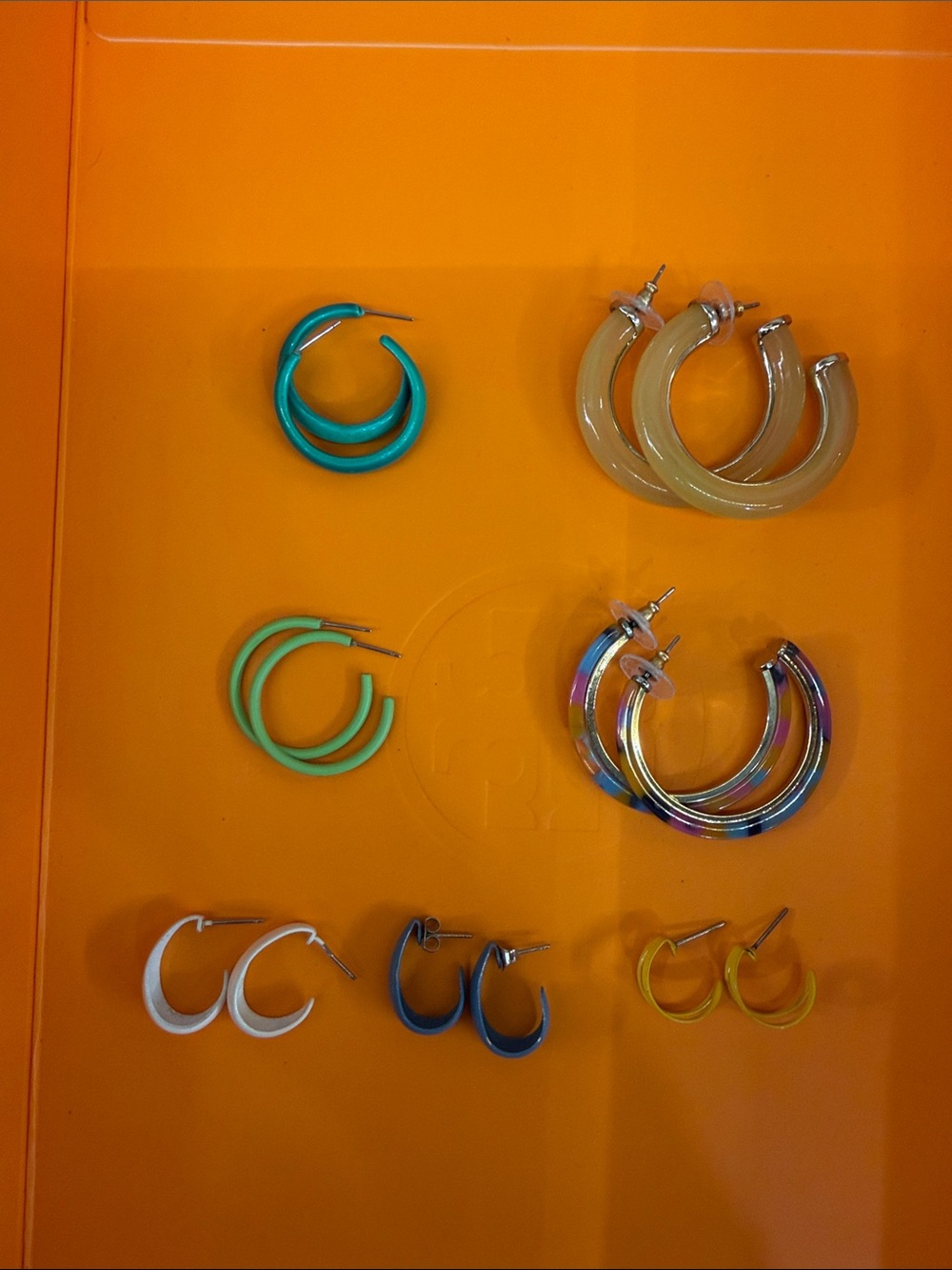 Assorted Green and Multicolor Hoop Earrings.